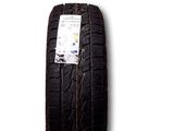 an image of a car tire on a white background with a sticker on it