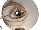 a lamp that is sitting on a table with a cord