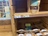 a shelf with a variety of food items on it