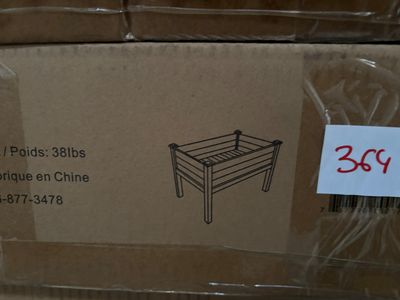 une boîte en carton sur laquelle est représenté un lit