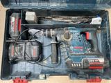 a tool box with tools in it sitting on the floor