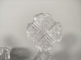 a glass object that is sitting on a glass table