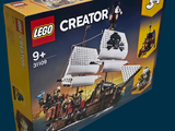 a box that has a lego pirate ship in it