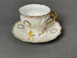 an image of a cup and saucer on a saucer