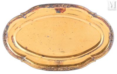 a gold tray with a decorative design on it