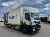 a picture of a delivery truck parked in a parking lot