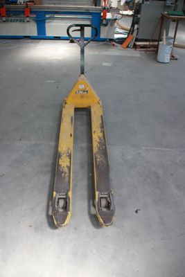 a fork lifter that is sitting in the garage