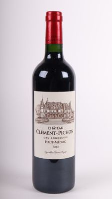 bottle of red wine with a red cap on a white background