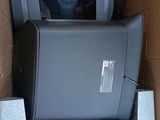 a television in a box that is sitting on top of it