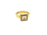 a close up of a gold ring with diamonds on it
