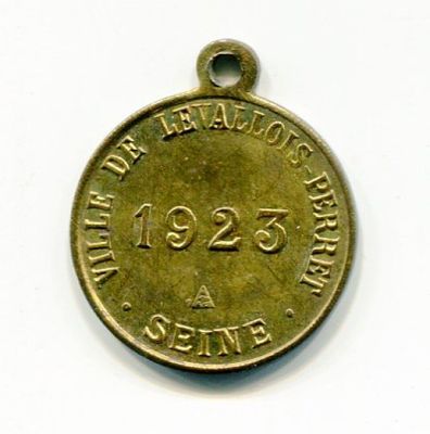 une image représentant une médaille sur laquelle figure la date de la bataille de la Somme
