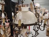 a chandelier that is hanging from the ceiling