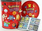 a tin of pokemon candy and a tin of candies