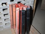 a lot of pipes that are stacked up on a pallet