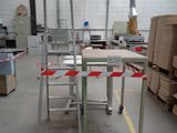 an image of a work area with a table and chairs