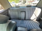 the back seat of a car with the back seats folded down