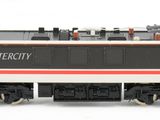 a black and white train on the tracks on a white background