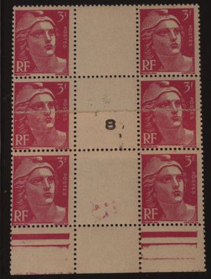 une image d'un timbre sur lequel figure le visage d'une femme