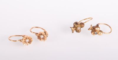 three pairs of gold earrings and a ring