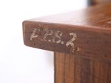 a close up of a wooden table with numbers on it