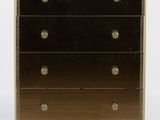 a black and gold chest of drawers on a white background