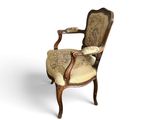an image of a chair with a floral upholstered seat