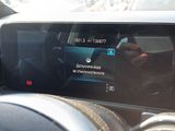 a picture of a car dashboard with a digital display