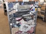 a metal cage with a bunch of items inside of it