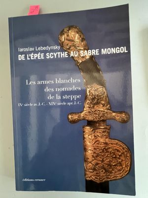 une affiche accrochée au mur sur laquelle figure un couteau
