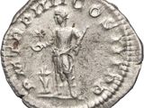 a silver coin with an image of a man holding a sword