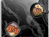 three pans with food cooking on a black stove top