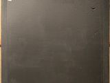 a picture of a picture of a blackboard on a wall