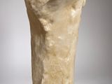 an image of a sculpture of a man ' s head on top of a base
