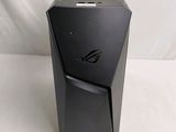 the front of a black computer case with a logo on it