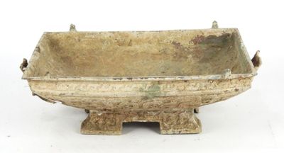 a small bowl that is sitting on a white surface