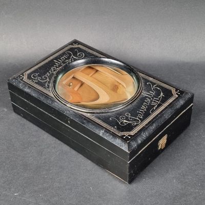 a black box with a picture of a person on it