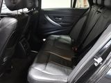 a black car with two seats in the back of it