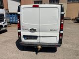 a white van that is parked in a parking lot