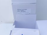 two boxes of white toilet paper with blue writing on them