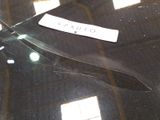 a close up of a pair of scissors on a table