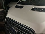 a white van that is parked in a garage