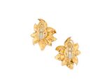 a pair of gold earrings with diamonds on a white background