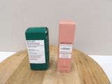 a bottle of blackhead and a tube of blackhead on a wooden table