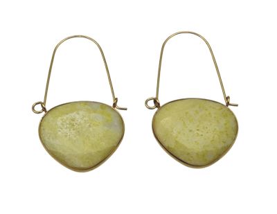 a pair of earrings with a yellow stone in the shape of a heart