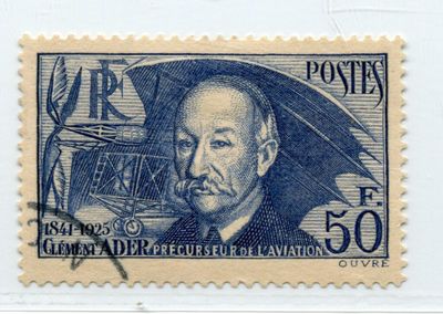 an old stamp with a picture of a man holding an umbrella