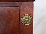a close up of a wooden table with a marble top