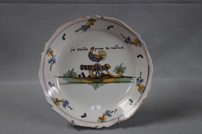a plate that has a picture of a rooster on it