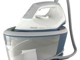 a close up of a white and blue steam iron on a white background