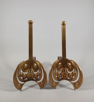 pair of antique brass candlesticks on wooden bases
