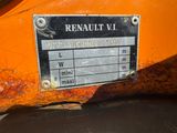 a close up of a sign on the side of an orange vehicle